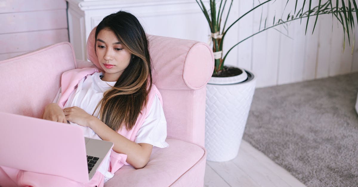 Why didn't my brioche rise? - Woman in Pink Shirt Sitting on Sofa Using Macbook Why didn't my brioche rise? - Woman in Pink Shirt Sitting on Sofa Using Macbook