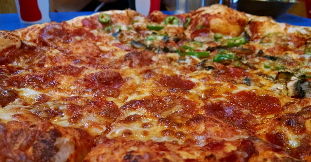 Why didn't the toppings on my pizza stick to the dough? - Brown and Red Pepperoni Pizza Why didn't the toppings on my pizza stick to the dough? - Brown and Red Pepperoni Pizza