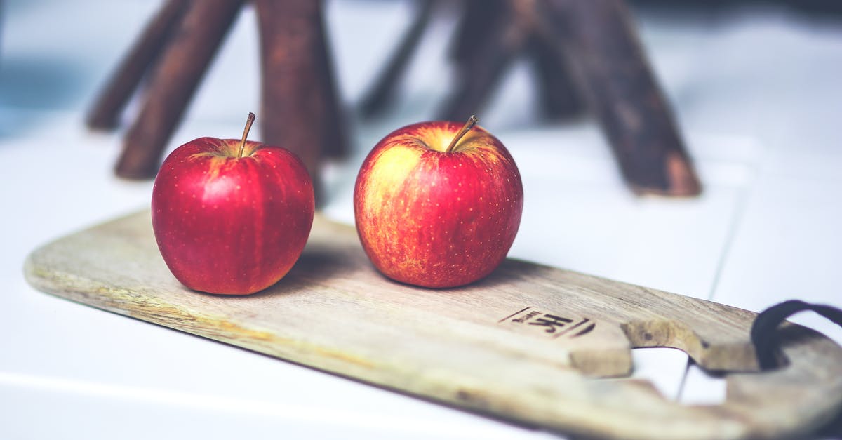 Why do apples sometimes taste bitter? - Two apples on the board Why do apples sometimes taste bitter? - Two apples on the board