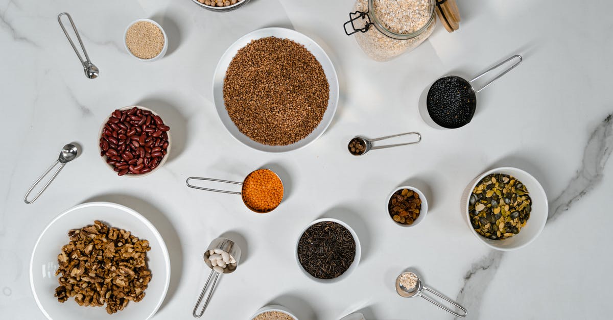 Why do canned beans have less FODMAPs than dried beans? - Assorted Spices on White Ceramic Bowl Why do canned beans have less FODMAPs than dried beans? - Assorted Spices on White Ceramic Bowl