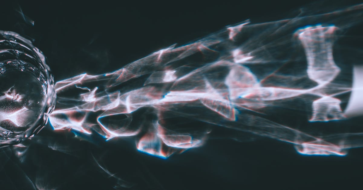 Why do my macarons have a proper shape and feet, but are hollow inside? - Reflection from glass on black background
