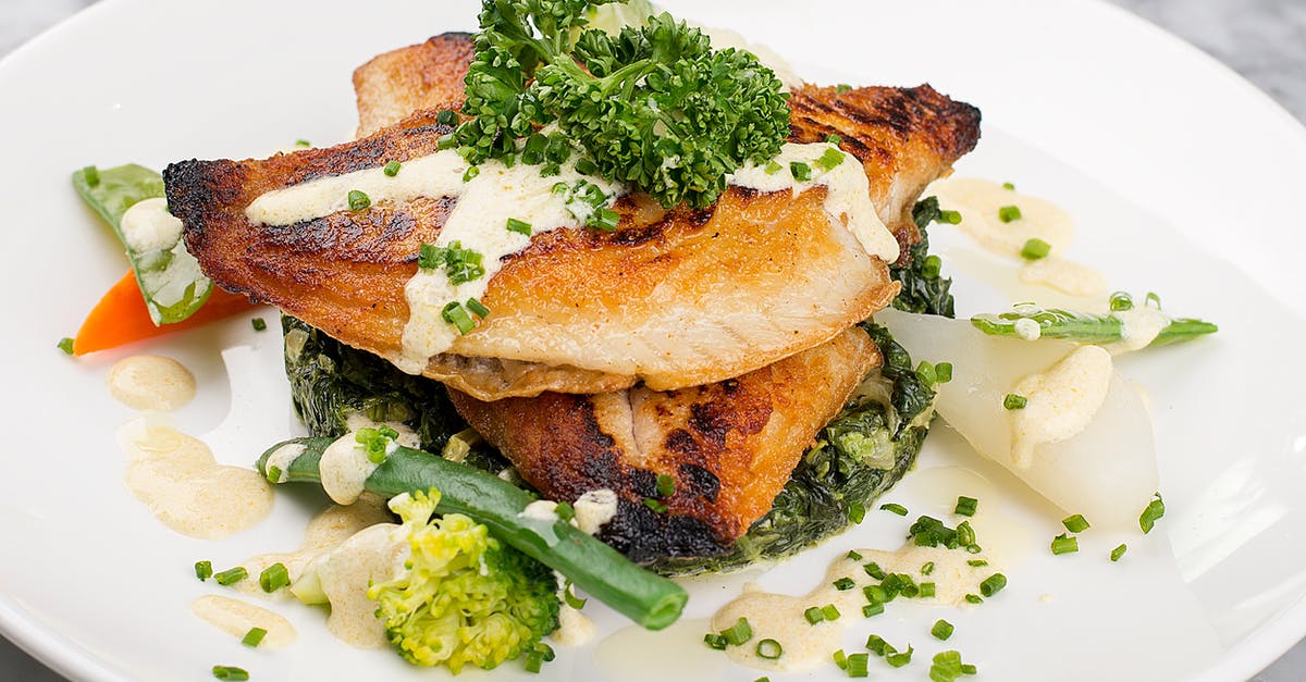 Why do my salmon fish cakes break up in frying? - A Dish with Fried Salmon and Sauce Why do my salmon fish cakes break up in frying? - A Dish with Fried Salmon and Sauce