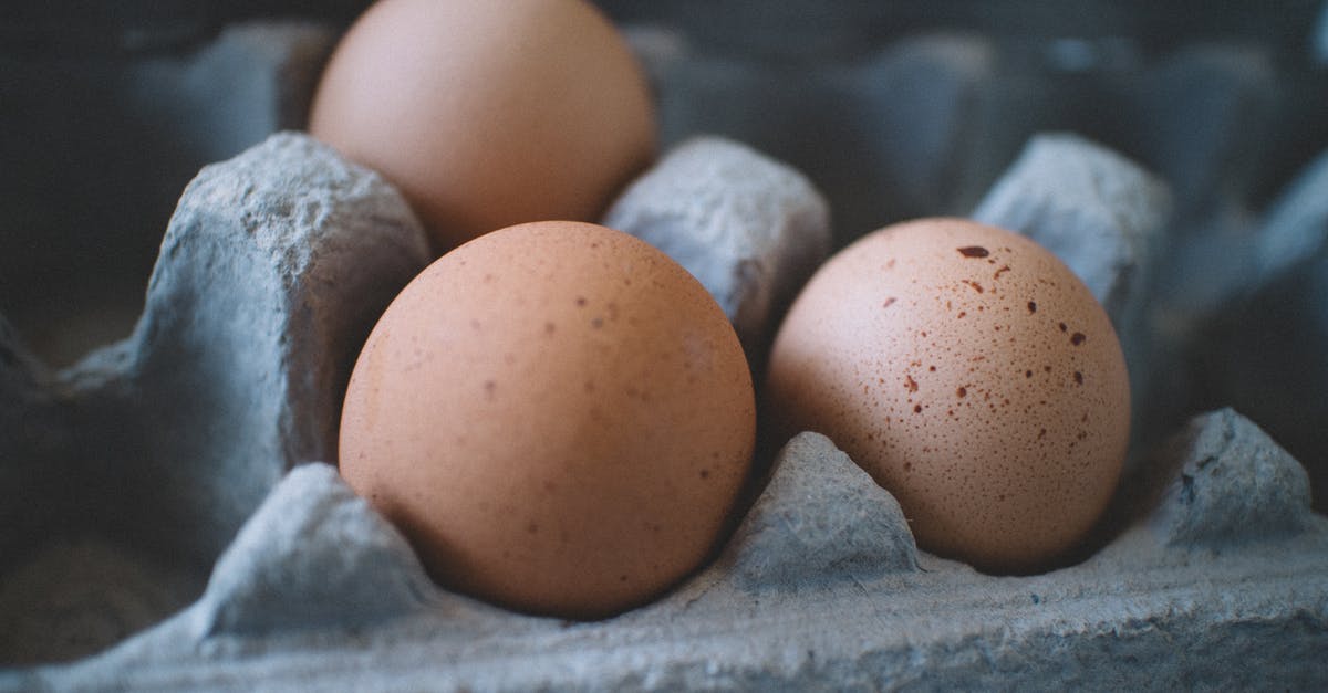 Why do organic eggs seem to be spoiled right after purchasing? - Selective Focus Photo of Three Eggs on Tray