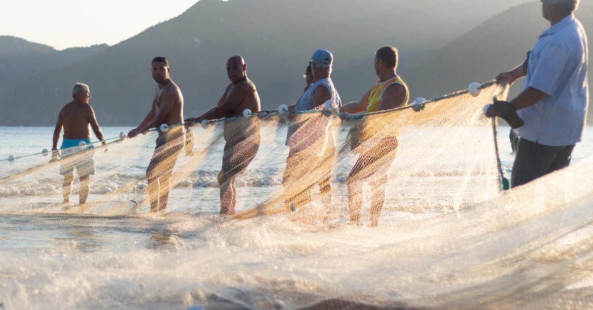 Why do people smash garlic? - Men Holding A Fishing Net Why do people smash garlic? - Men Holding A Fishing Net