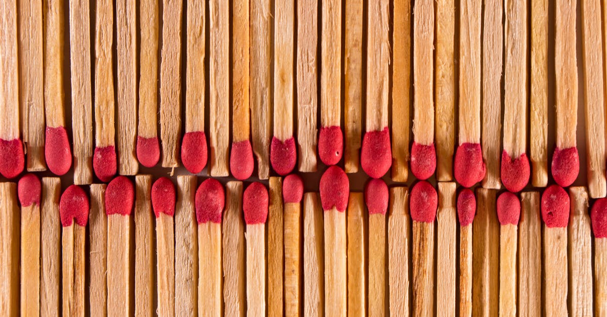 Why do Pocky and other "stick" biscuits have this distinct burn pattern? - Top view of thin wooden matches with red flammable heads placed in rows as abstract background Why do Pocky and other "stick" biscuits have this distinct burn pattern? - Top view of thin wooden matches with red flammable heads placed in rows as abstract background