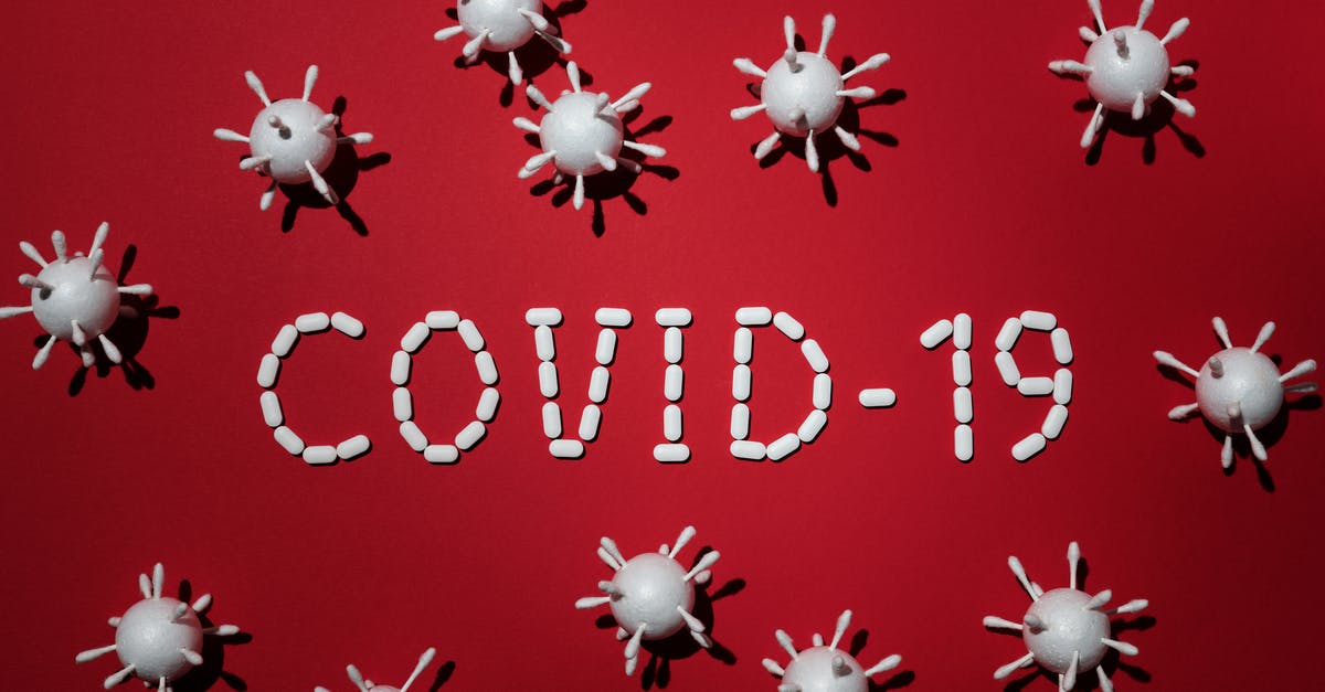 Why do some Parmigiano Reggiano contain bacterial cultures? - Concept Of Covid-19 In Red Background Why do some Parmigiano Reggiano contain bacterial cultures? - Concept Of Covid-19 In Red Background