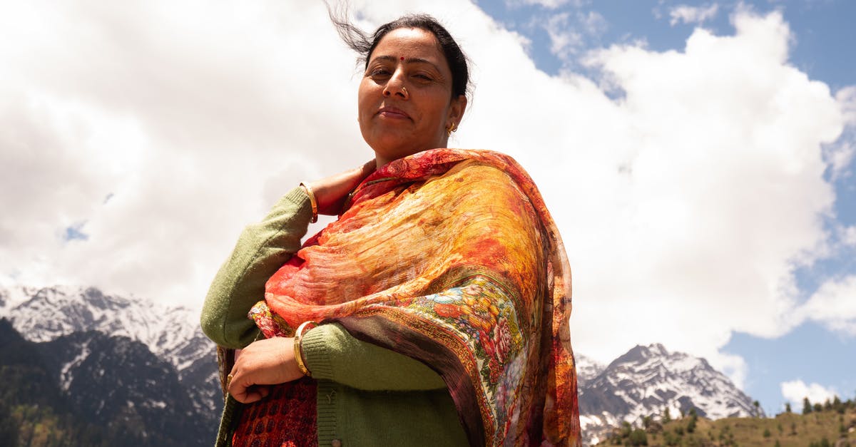 Why do spots appear on iceburg lettuce during cold storage?(0~4℃) - Positive ethnic female resting in village near mountains Why do spots appear on iceburg lettuce during cold storage?(0~4℃) - Positive ethnic female resting in village near mountains
