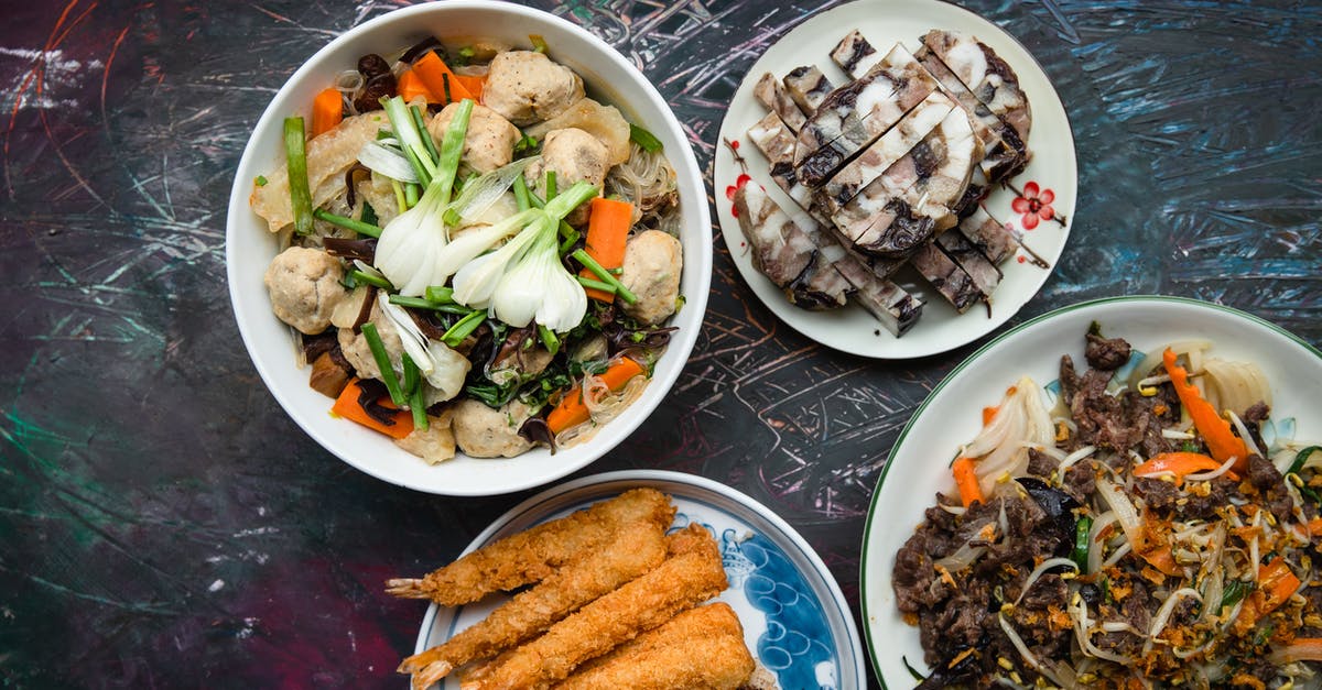 Why do Vietnamese dishes feature cut-up meat with the bone in? - Dishes on White Serving Plates Why do Vietnamese dishes feature cut-up meat with the bone in? - Dishes on White Serving Plates