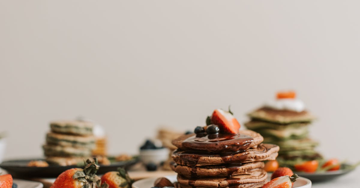 Why do we like dessert, but not extremely salty, sour, umami, or bitter foods alone? [closed] - Close-Up Shot of Delicious Pancakes with Berries on Top