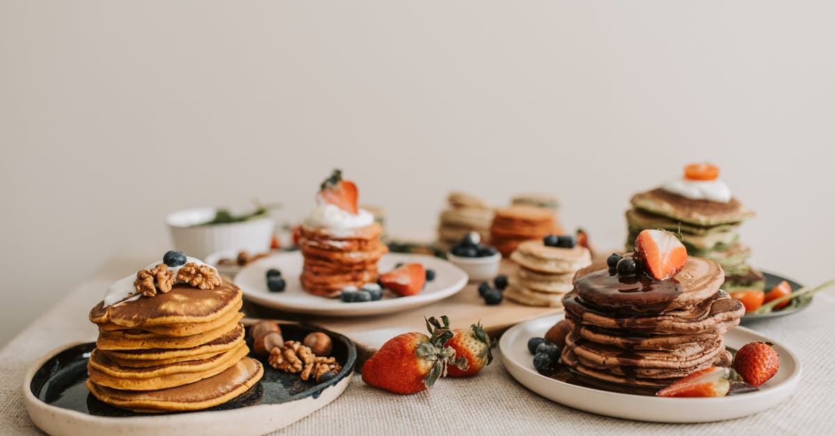 Why do we like dessert, but not extremely salty, sour, umami, or bitter foods alone? [closed] - Close-Up Shot of Delicious Pancakes with Berries and Nuts