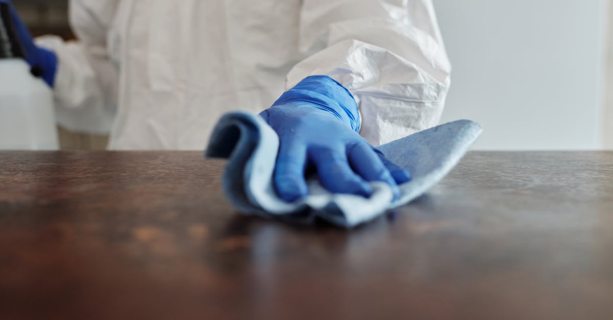 Why do you have to rinse rice? - Close-Up Photo Of Person Cleaning The Table Why do you have to rinse rice? - Close-Up Photo Of Person Cleaning The Table