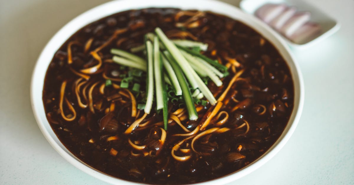 Why does adding salt to microwaved broth make it foamy? - Bowl of Soup with Nood Why does adding salt to microwaved broth make it foamy? - Bowl of Soup with Nood
