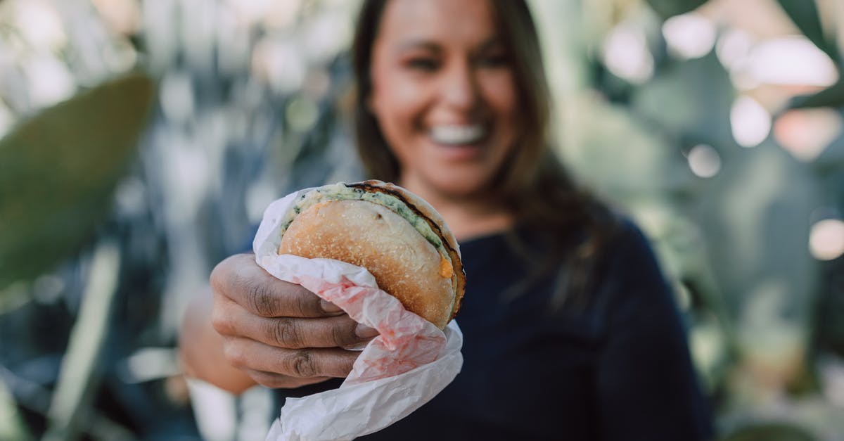 Why does bread with filling separate and how do I prevent it? - A Woman Holding Sandwich