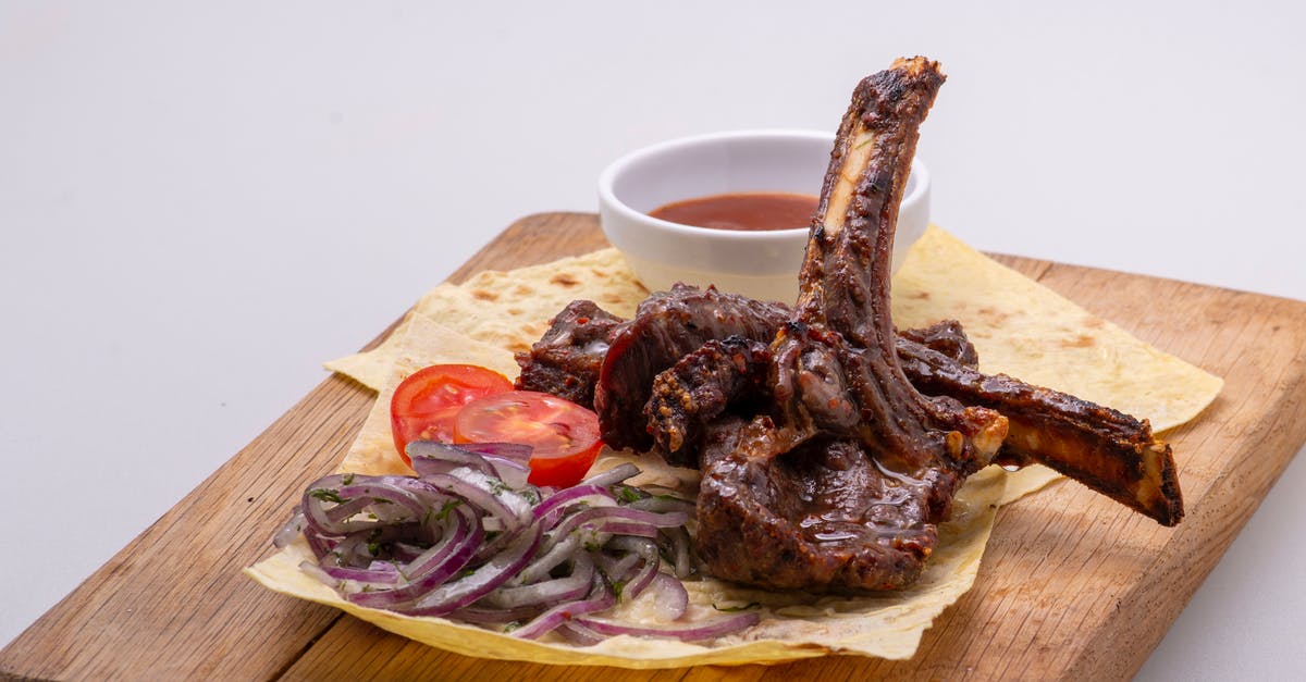 Why does flatbread have to be microwaved / cooked / toasted? - Roasted Meat and Flatbread on a Wooden Board Why does flatbread have to be microwaved / cooked / toasted? - Roasted Meat and Flatbread on a Wooden Board