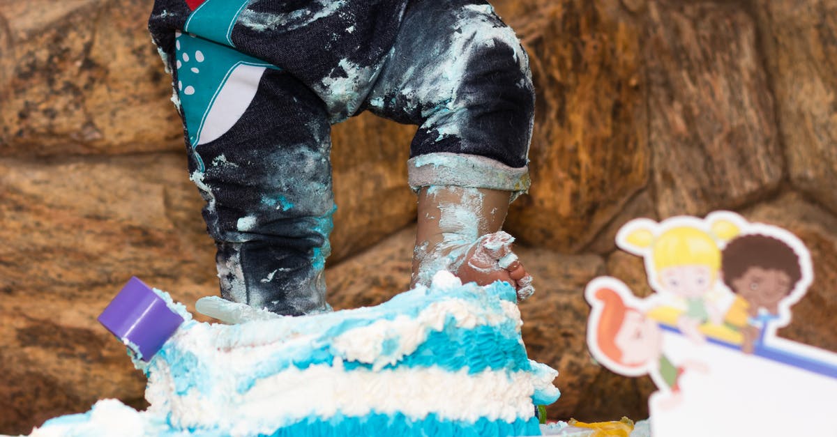 Why does food spoil in the freezer? - Faceless child pushing festive cake Why does food spoil in the freezer? - Faceless child pushing festive cake