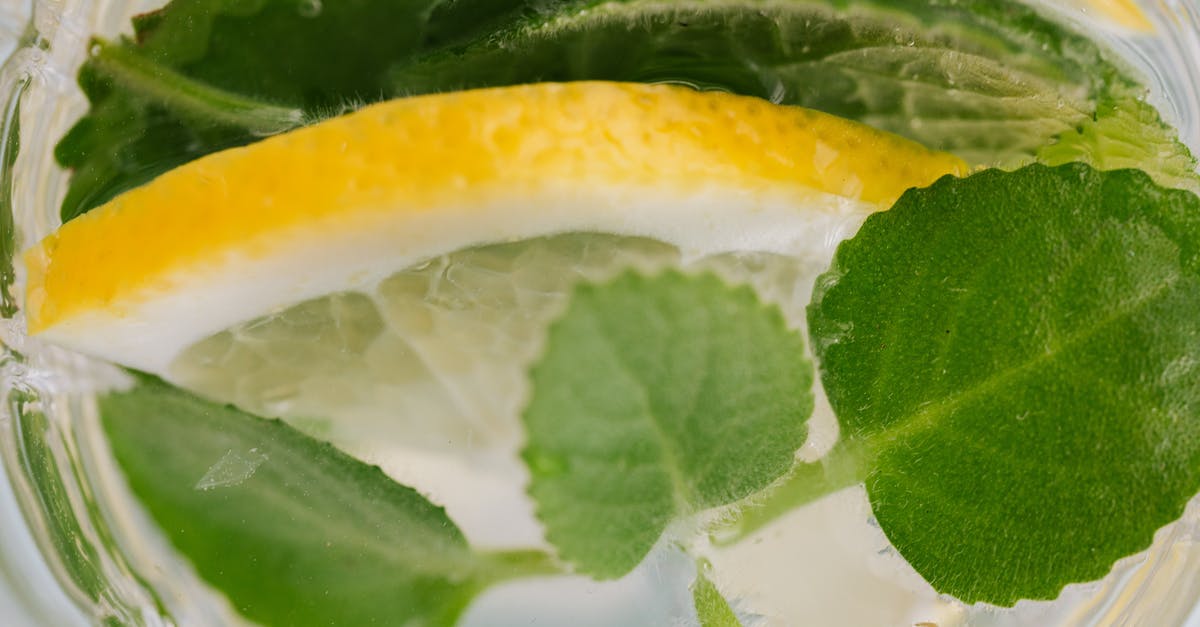 Why does freezing vegetable shortening alter its appearance? - Closeup top view of nonalcoholic drink made of slices of lemon and leaves of mint Why does freezing vegetable shortening alter its appearance? - Closeup top view of nonalcoholic drink made of slices of lemon and leaves of mint
