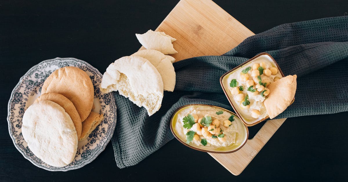 Why does horseradish paste "curdle" when cooked? - Photo of Hummus and Bread on Top of a Chopping Board Why does horseradish paste "curdle" when cooked? - Photo of Hummus and Bread on Top of a Chopping Board