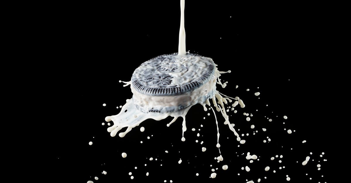 Why does milk and white chocolate have different tempering temperatures? - Pouring Milk on Chocolate Cookie with Vanilla Filling Why does milk and white chocolate have different tempering temperatures? - Pouring Milk on Chocolate Cookie with Vanilla Filling