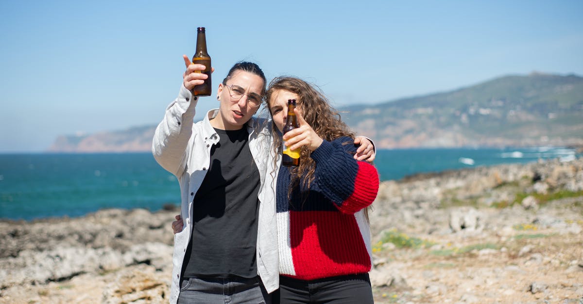why does my beer batter seem to hold too much oil? - Photo of a Couple Holding Bottles of Beer why does my beer batter seem to hold too much oil? - Photo of a Couple Holding Bottles of Beer