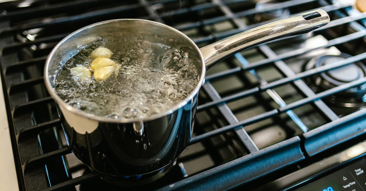 Why does my fondue call to wipe the pot with garlic? - Pot with Boiling Water and Garlic Why does my fondue call to wipe the pot with garlic? - Pot with Boiling Water and Garlic