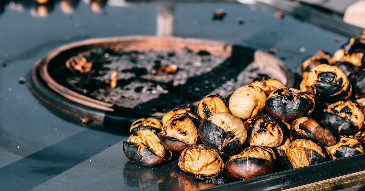Why does my food taste like propane when i grill? - Grilled chestnuts on table in street Why does my food taste like propane when i grill? - Grilled chestnuts on table in street