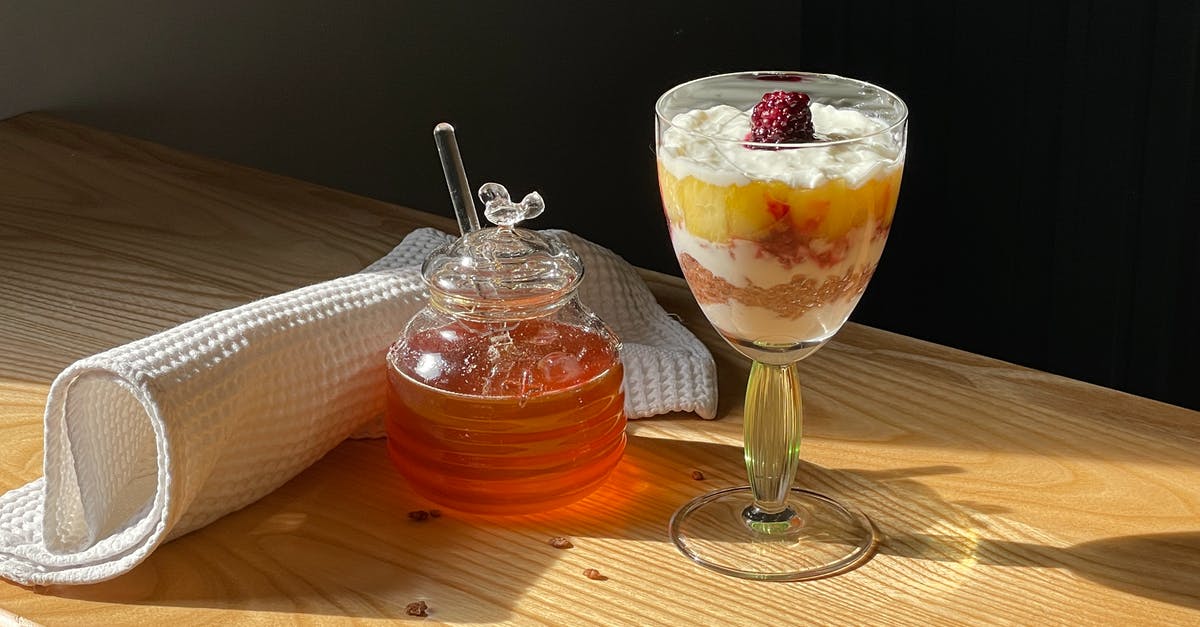 Why does my honey always crystallized? - Photo of a Drink Near a Jar of Honey Why does my honey always crystallized? - Photo of a Drink Near a Jar of Honey