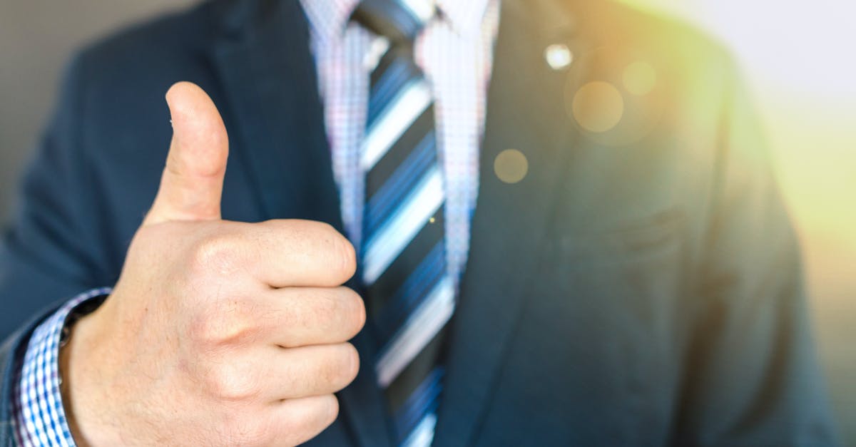 Why does my "dulce de leche" look like this? - Close-up Photo of Man Wearing Black Suit Jacket Doing Thumbs Up Gesture Why does my "dulce de leche" look like this? - Close-up Photo of Man Wearing Black Suit Jacket Doing Thumbs Up Gesture