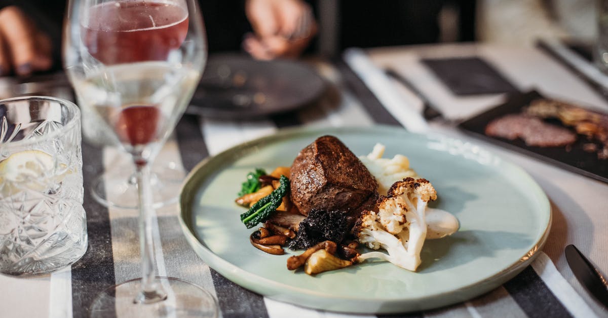 Why does my roast beef smell wonderful but tastes bland? - Tasty grilled steak served with cauliflower and mushrooms placed on table with wineglass filled with alcohol drink in restaurant on blurred background Why does my roast beef smell wonderful but tastes bland? - Tasty grilled steak served with cauliflower and mushrooms placed on table with wineglass filled with alcohol drink in restaurant on blurred background