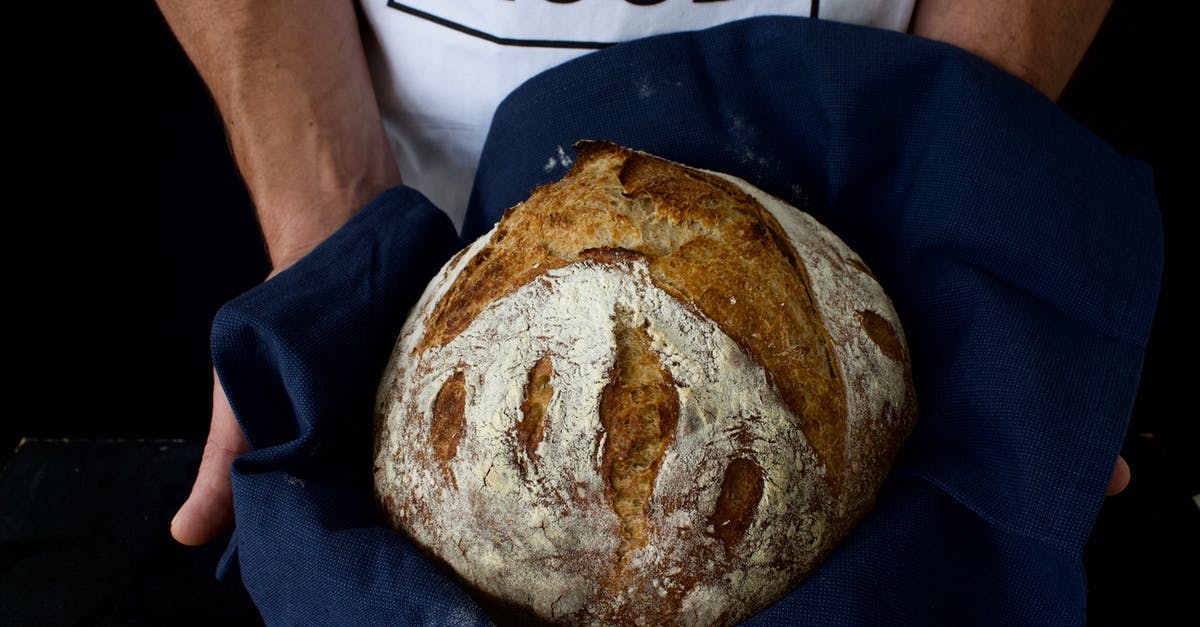 why does my sourdough bread have lumps of flour - Person Holding a Sourdough Bread why does my sourdough bread have lumps of flour - Person Holding a Sourdough Bread