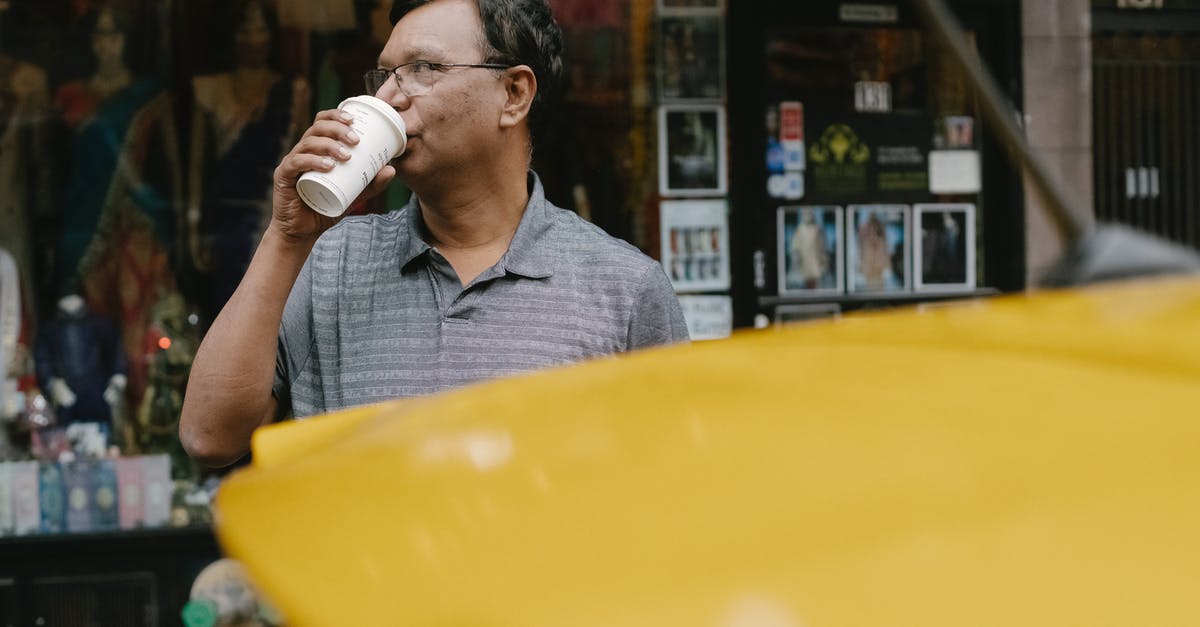 Why does my store brand butter break apart - Ethnic man drinking coffee on street Why does my store brand butter break apart - Ethnic man drinking coffee on street