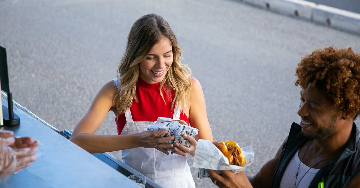 Why does sauce go watery after freezing? - From above of positive multiethnic couple eating tasty burgers wrapped in paper at food truck Why does sauce go watery after freezing? - From above of positive multiethnic couple eating tasty burgers wrapped in paper at food truck