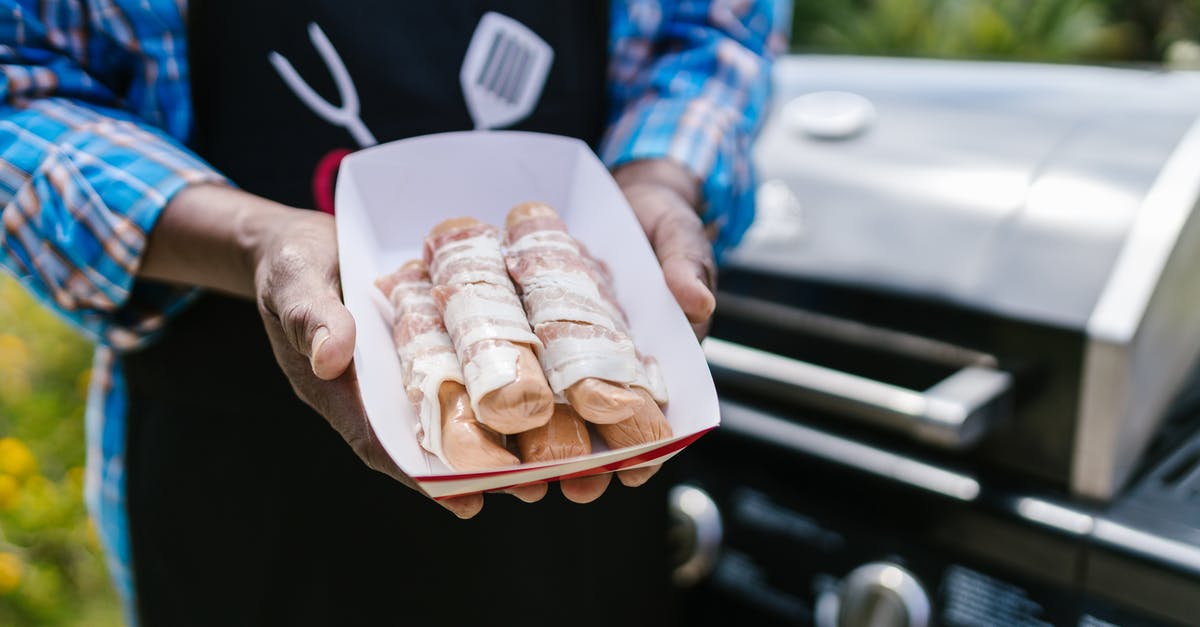 Why does some bacon contain whey powder? - Person Holding Brown Bread With Ham and Cheese Why does some bacon contain whey powder? - Person Holding Brown Bread With Ham and Cheese
