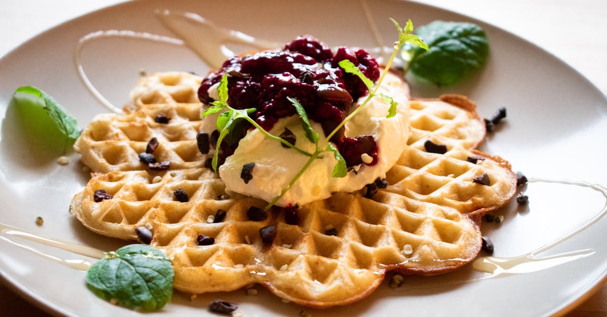Why does waffle dough get dark? - Waffle on White Ceramic Plate Why does waffle dough get dark? - Waffle on White Ceramic Plate