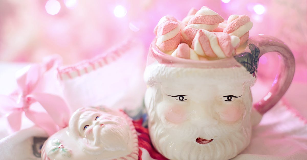 Why does whipped Cream sometimes sink in warm beverages? - White and Pink Santa Claus Mug Why does whipped Cream sometimes sink in warm beverages? - White and Pink Santa Claus Mug