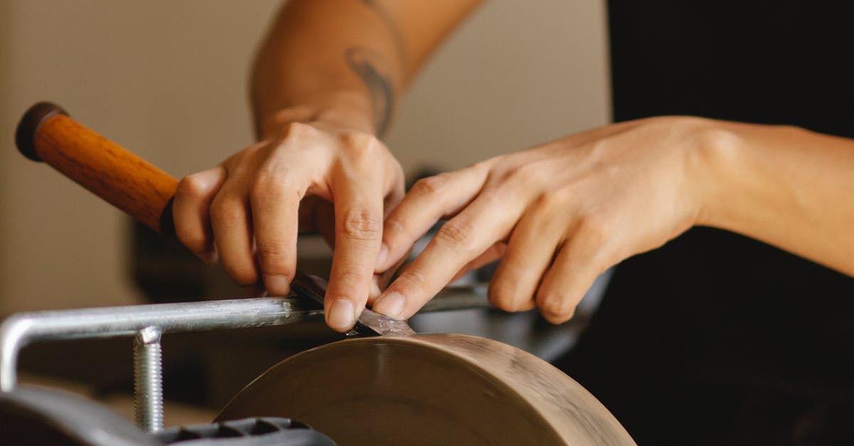 Why does Wusthof call Honing Steel 'Sharpening steel'? - Crop master grinding chisel in workshop Why does Wusthof call Honing Steel 'Sharpening steel'? - Crop master grinding chisel in workshop