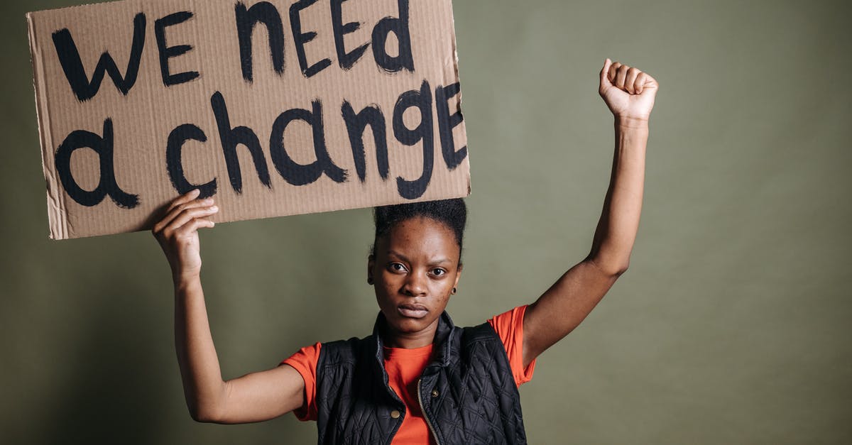 Why don't we need to ice-bathe all leftovers before refrigeration? - A Woman Holding a Placard