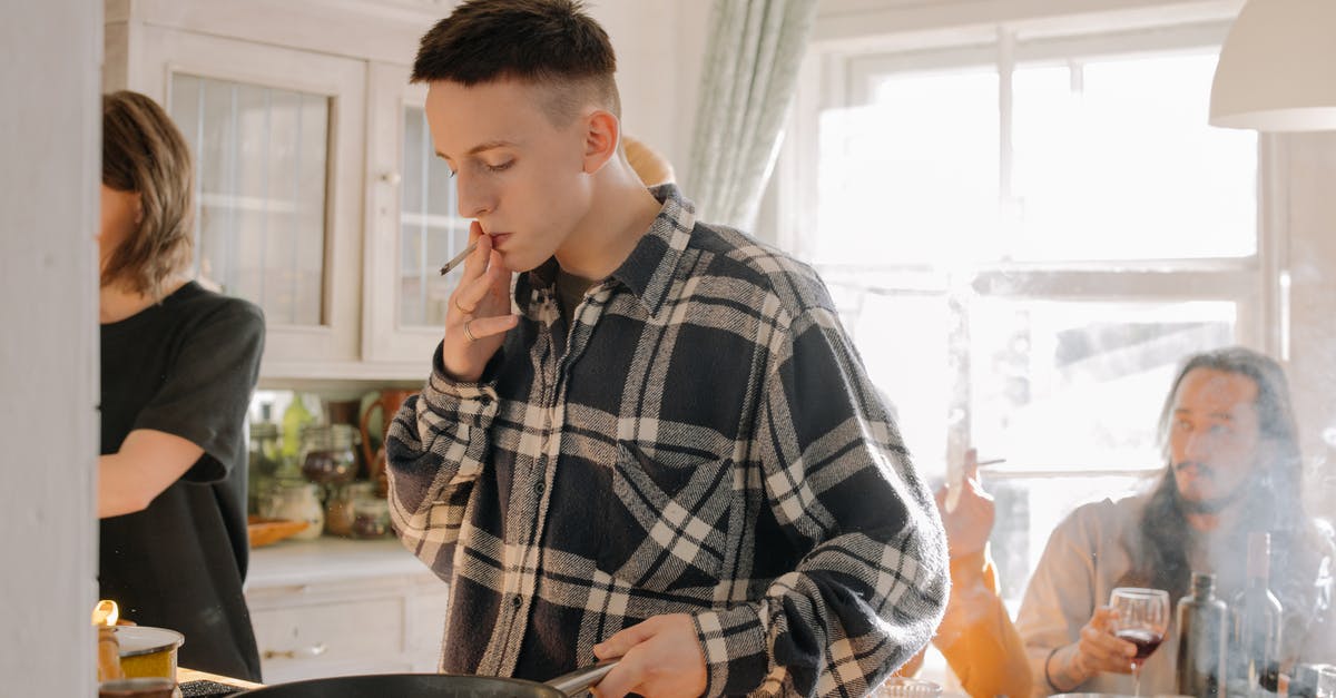 Why have all of my quality pans started smoking at once? - Man in Black and White Plaid Dress Shirt Holding Chopsticks Why have all of my quality pans started smoking at once? - Man in Black and White Plaid Dress Shirt Holding Chopsticks