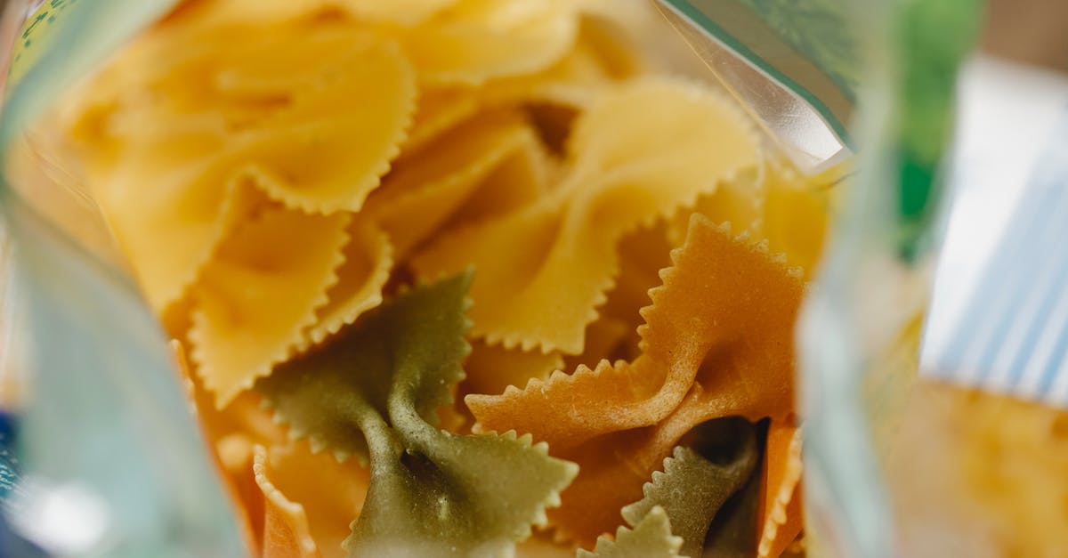 Why hot pack when raw pack is just as fast? - Pack of dry raw farfalle pasta placed on table