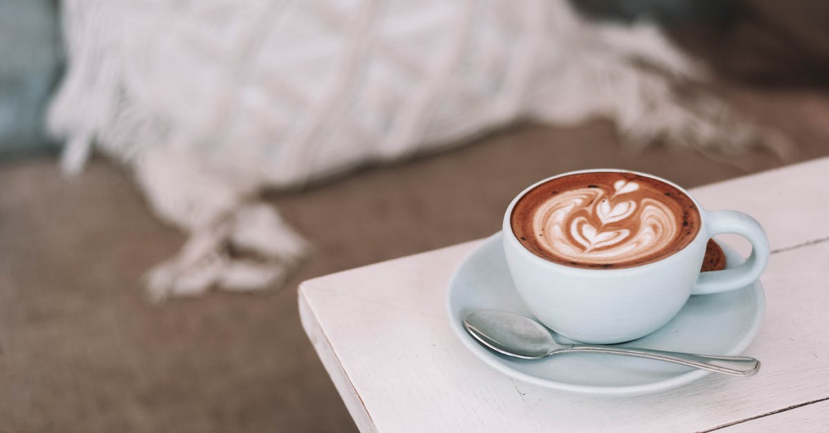 Why is cream curdled in coffee? - Photo Of White Ceramic Teacup Why is cream curdled in coffee? - Photo Of White Ceramic Teacup