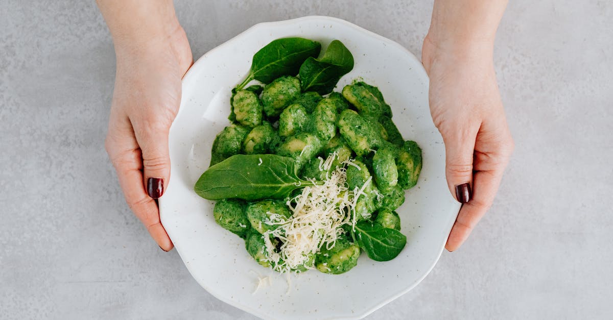 Why is gnocchi a dumpling and not a noodle? - A Woman Holding a Plate of Gnocchi Why is gnocchi a dumpling and not a noodle? - A Woman Holding a Plate of Gnocchi