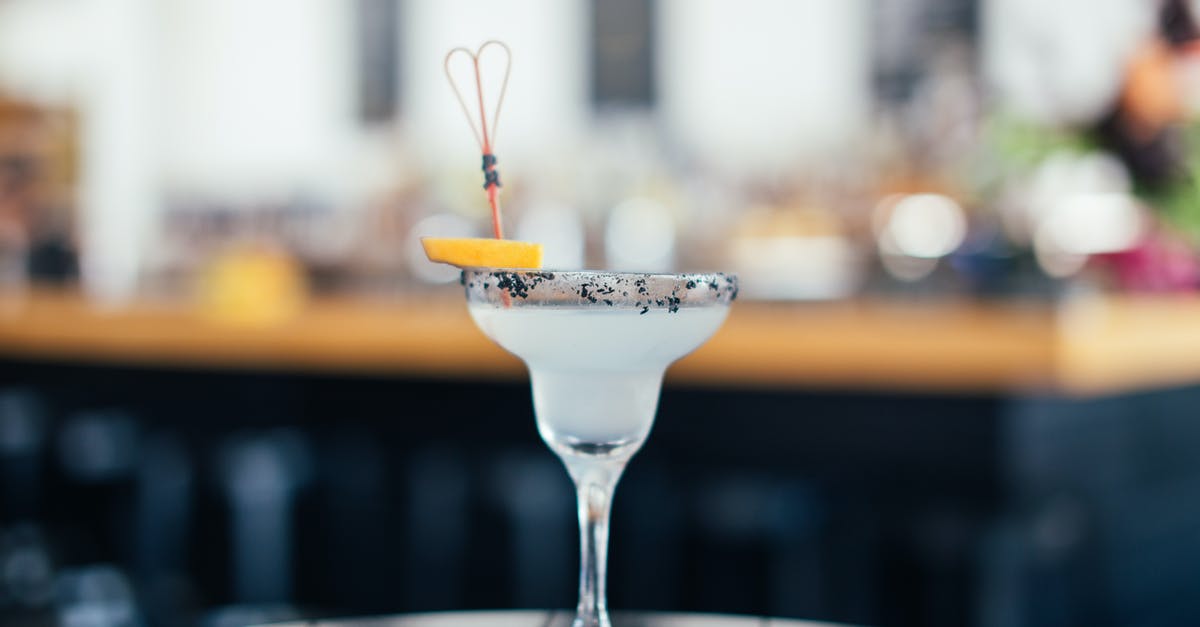 Why is maple syrup less viscous than other liquid sugars? - Glass of sweet cold alcoholic cocktail on table Why is maple syrup less viscous than other liquid sugars? - Glass of sweet cold alcoholic cocktail on table