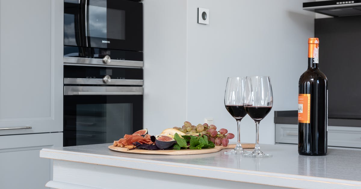 Why is meat red? - Wineglasses near fruits on counter Why is meat red? - Wineglasses near fruits on counter