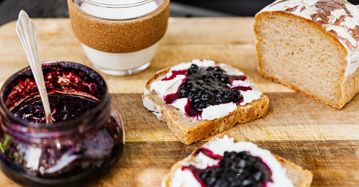 Why is my blueberry jam grainy? - Brown Bread with Jam and White Cream on Brown Wooden Table Why is my blueberry jam grainy? - Brown Bread with Jam and White Cream on Brown Wooden Table