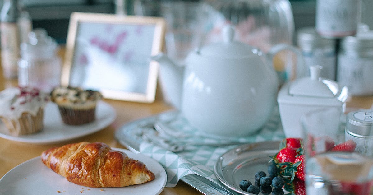 Why is my blueberry jam grainy? - Appetizing croissant and muffins served on table with teapot and berries Why is my blueberry jam grainy? - Appetizing croissant and muffins served on table with teapot and berries