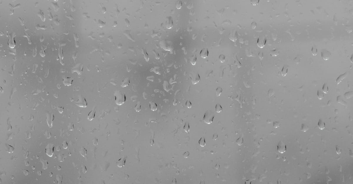 Why is my bread so dense and moist? - Full frame through window glass covered with water drops on rainy gloomy weather Why is my bread so dense and moist? - Full frame through window glass covered with water drops on rainy gloomy weather
