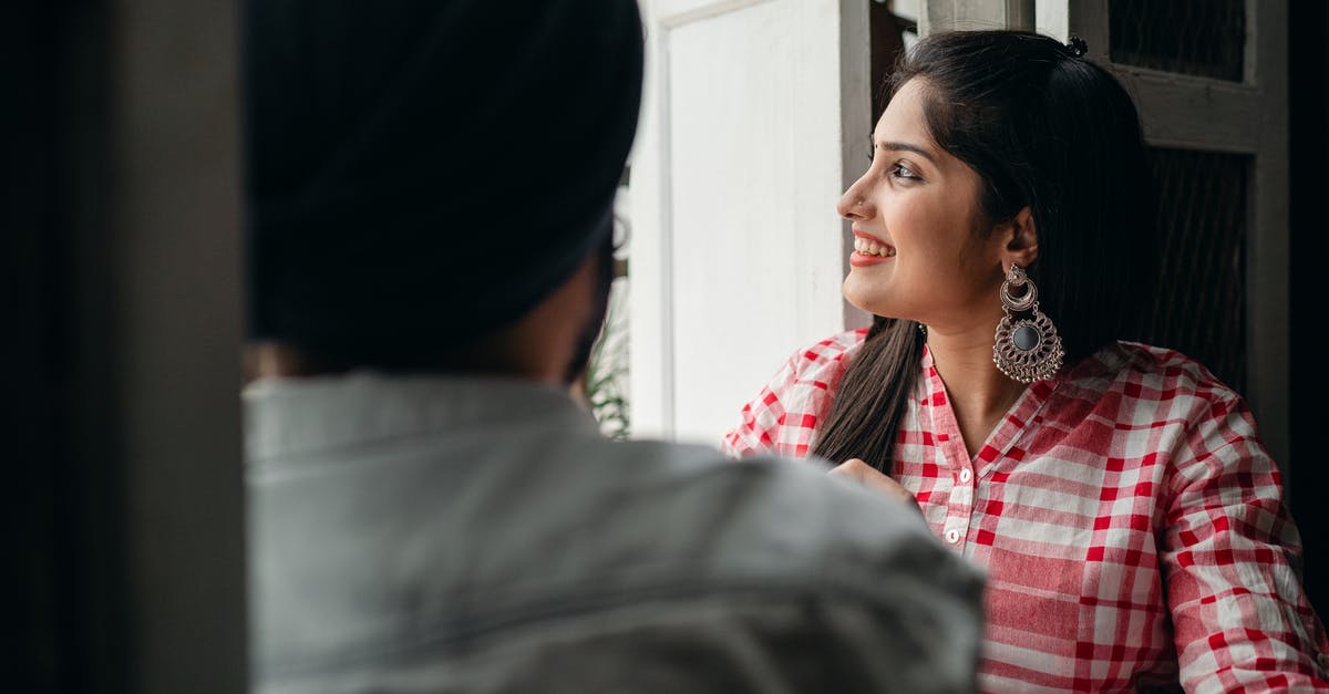 Why is there no pork on the Indian take-away menu? - Cheerful Indian wife spending time with crop husband at home Why is there no pork on the Indian take-away menu? - Cheerful Indian wife spending time with crop husband at home