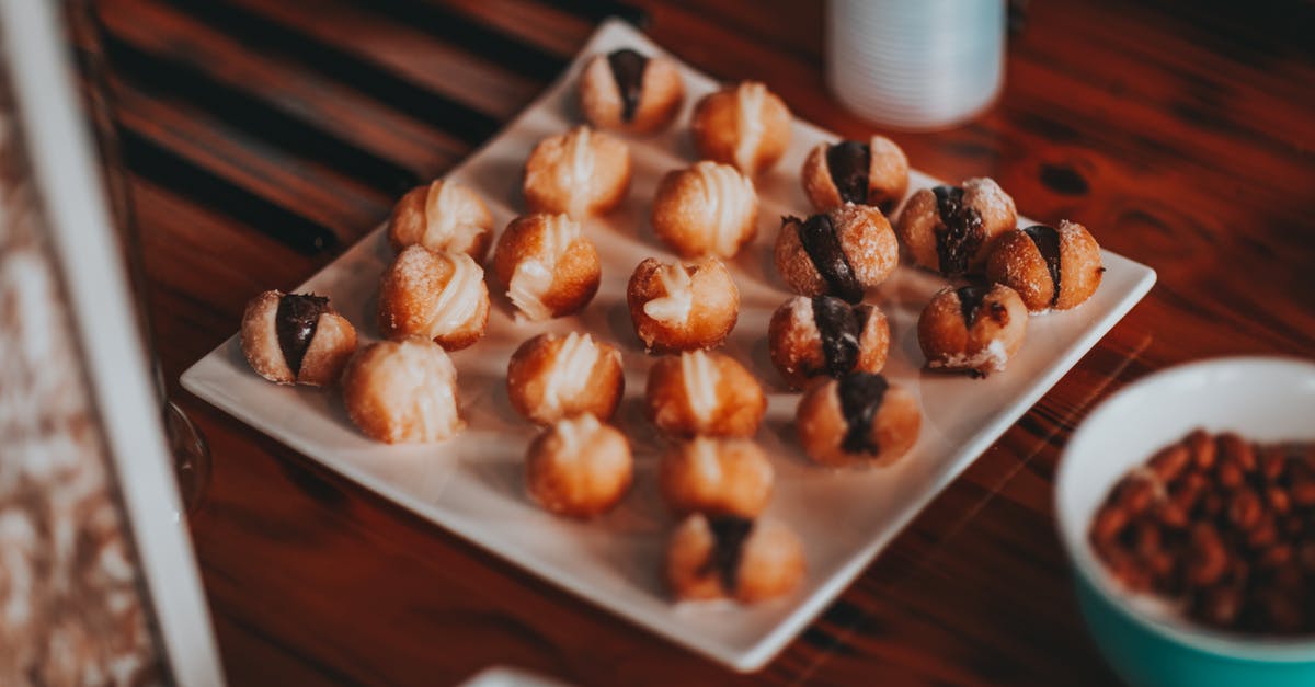 Why non-flavored variant is usually vanilla? - Yummy sweet dessert served on wooden table Why non-flavored variant is usually vanilla? - Yummy sweet dessert served on wooden table