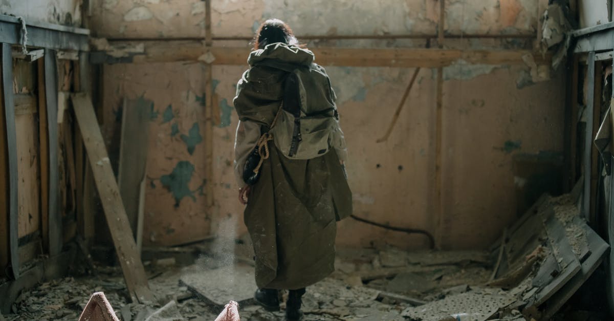 Why peel tomatoes? - Person in Brown Coat and Black Pants Standing on Gray Concrete Floor