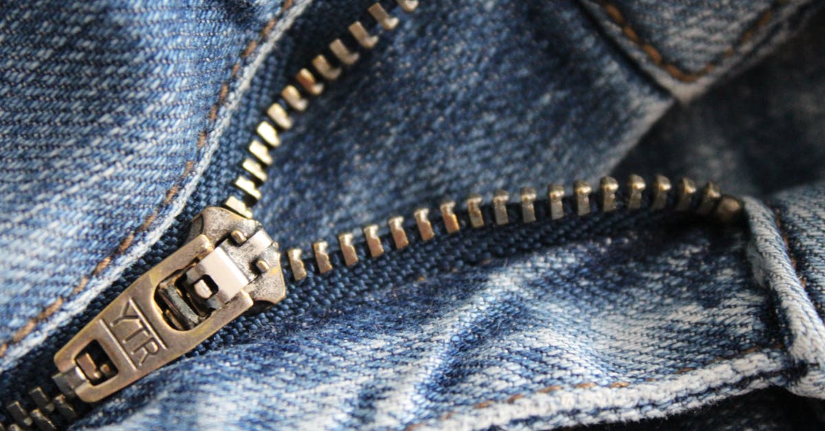 Why proof a baguette seam side up - Close Up of Zipper of Blue Denim Bottoms Why proof a baguette seam side up - Close Up of Zipper of Blue Denim Bottoms