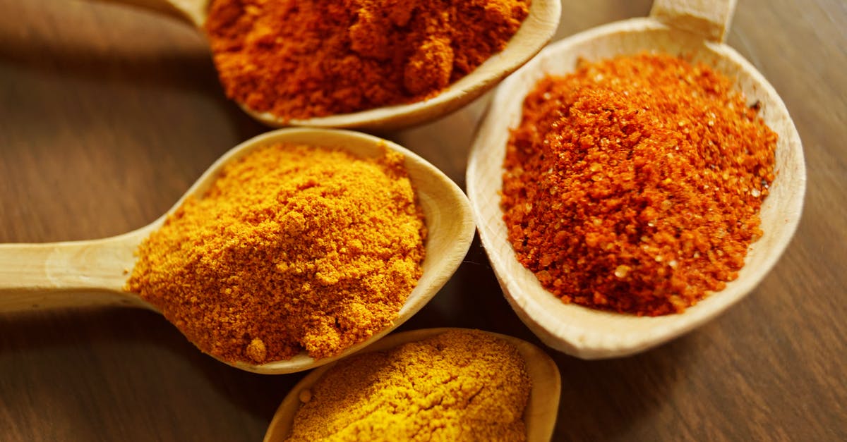 Why put cinnamon in chili? - Four Assorted Spices On Wooden Spoons Why put cinnamon in chili? - Four Assorted Spices On Wooden Spoons